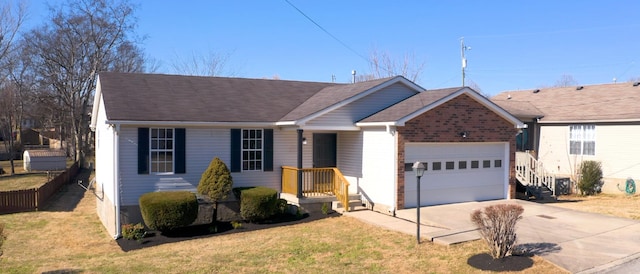 ranch-style house featuring a garage and a front yard