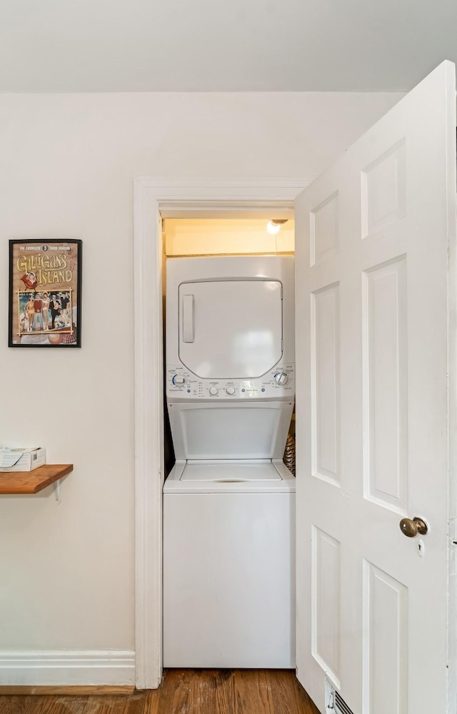 1704 Temple Ave, Nashville, TN 37215 - laundry area with stacked washer / dryer and hardwood / wood-style floors