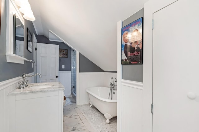 1704 Temple Ave, Nashville, TN 37215 - bathroom with lofted ceiling, vanity, and shower with separate bathtub