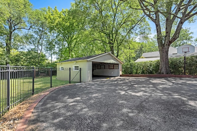 1704 Temple Ave, Nashville, TN 37215 - exterior space with a lawn and a carport