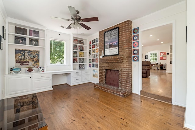 1704 Temple Ave, Nashville, TN 37215 - living room with ceiling fan, light wood-type flooring, built in desk, and a fireplace