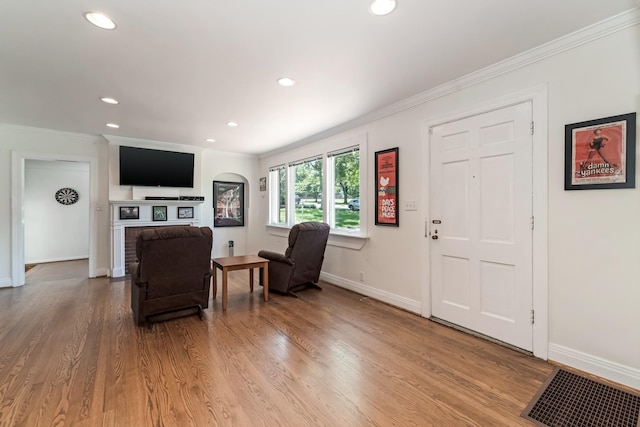 1704 Temple Ave, Nashville, TN 37215 - living room with hardwood / wood-style flooring, a fireplace, and ornamental molding