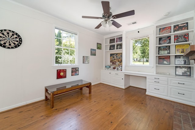 1704 Temple Ave, Nashville, TN 37215 - office space with crown molding, ceiling fan, wood-type flooring, and built in desk