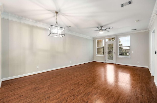 unfurnished living room with ceiling fan, ornamental molding, and dark hardwood / wood-style flooring