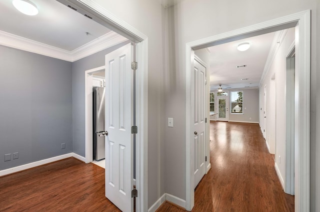 hall featuring crown molding and wood-type flooring