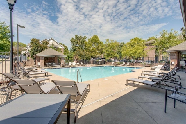 view of pool featuring a gazebo and a patio area