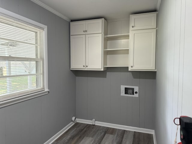 laundry room with cabinets, ornamental molding, hookup for a washing machine, and dark hardwood / wood-style floors