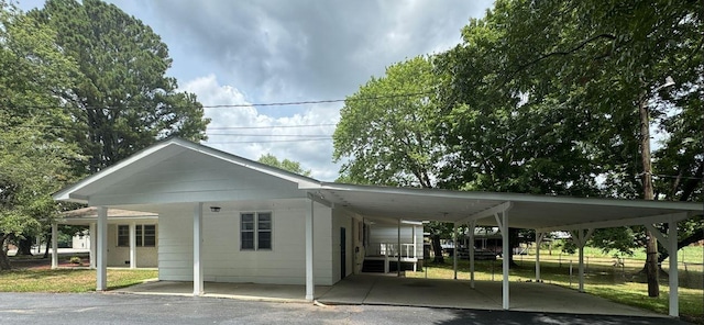 view of car parking with a carport