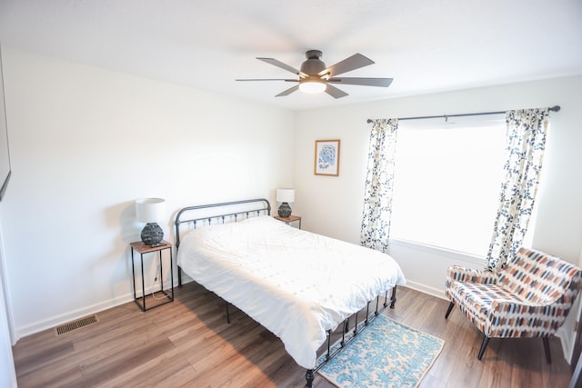 bedroom featuring ceiling fan and wood-type flooring