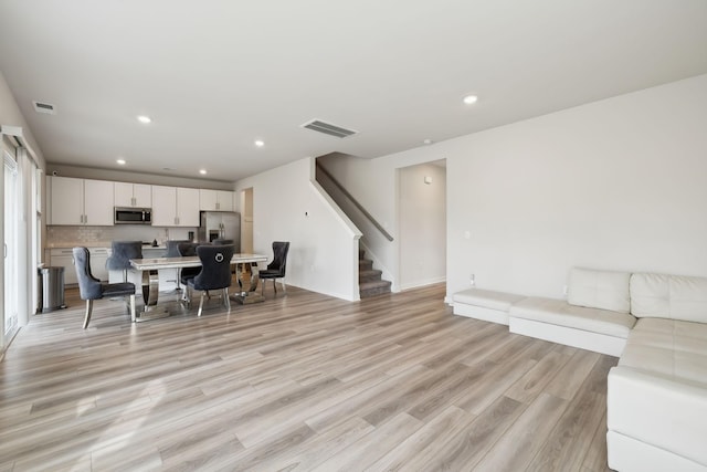 living room with light wood-type flooring