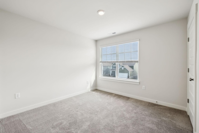 spare room with carpet flooring