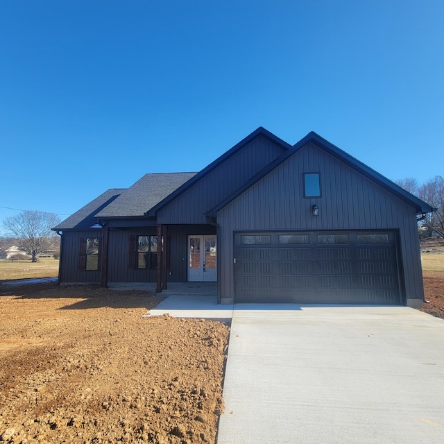 modern farmhouse with a garage