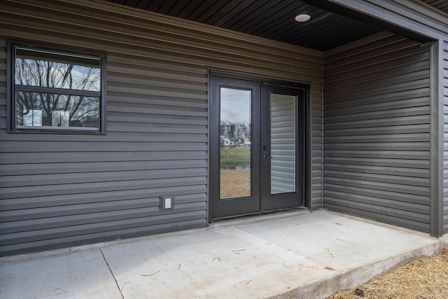 entrance to property featuring a patio area