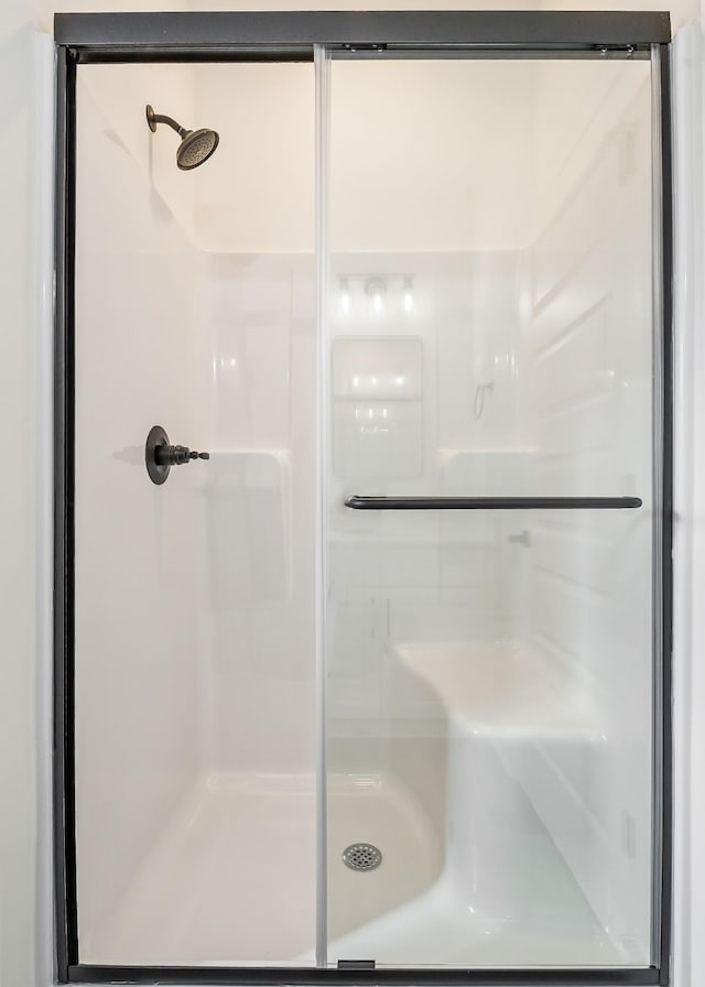 bathroom featuring walk in shower