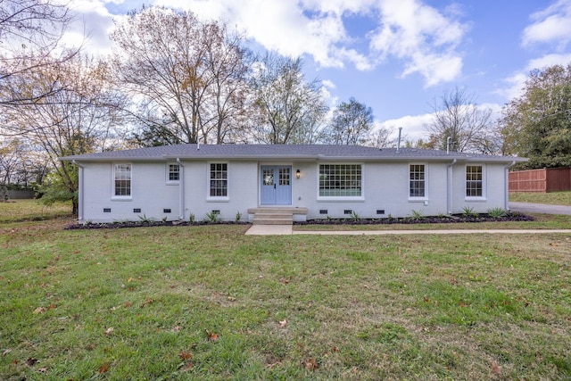 single story home with a front lawn