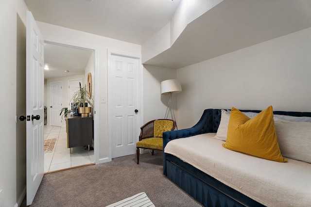 bedroom featuring light colored carpet