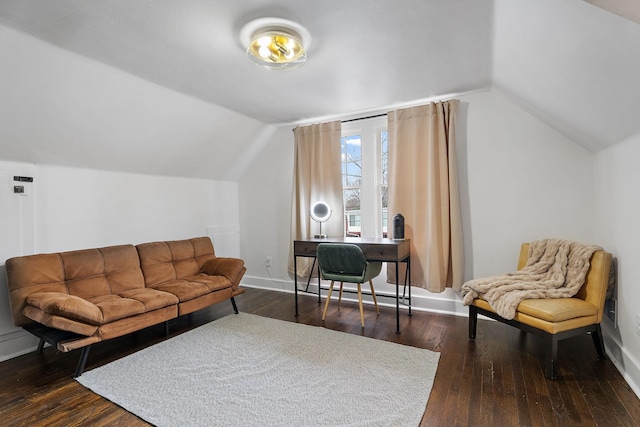 living room featuring dark hardwood / wood-style flooring and vaulted ceiling