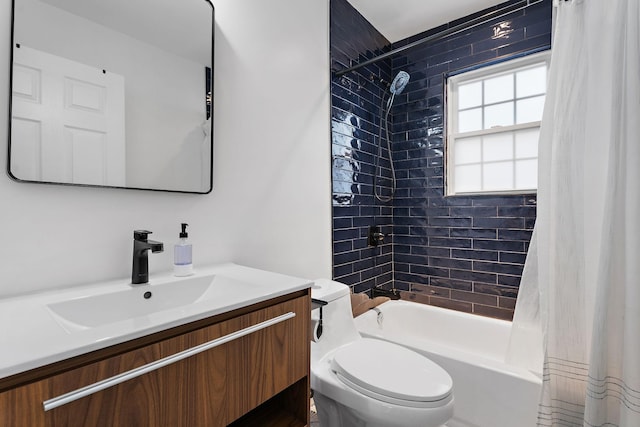 full bathroom featuring shower / bath combination with curtain, vanity, and toilet