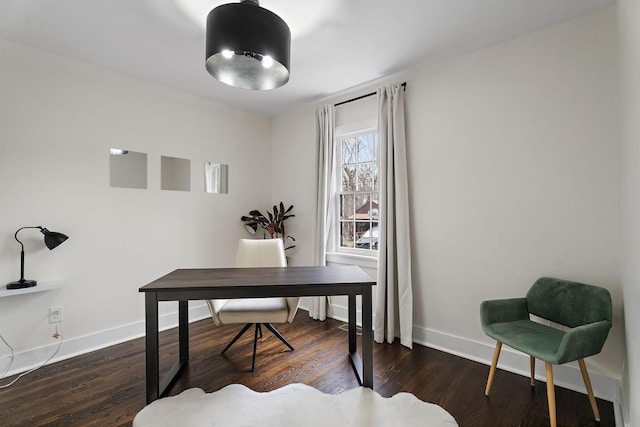 office with dark hardwood / wood-style flooring