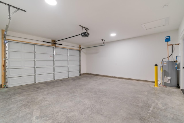 garage with a garage door opener and gas water heater