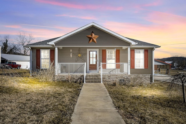 view of front of property featuring covered porch