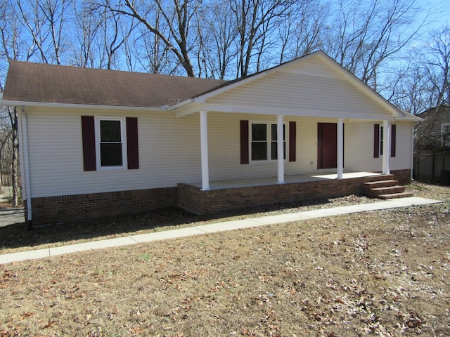 ranch-style house featuring a porch