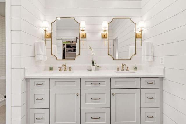 bathroom with vanity and wooden walls