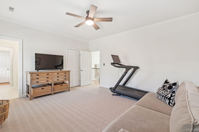 workout room featuring light carpet, ornamental molding, and ceiling fan