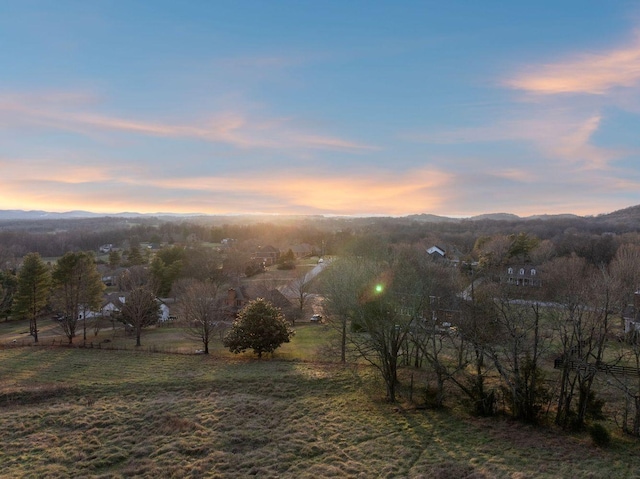 mountain view featuring a rural view