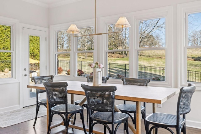 sunroom with plenty of natural light