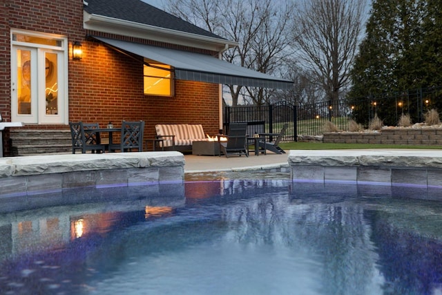 view of pool featuring outdoor lounge area and a patio area