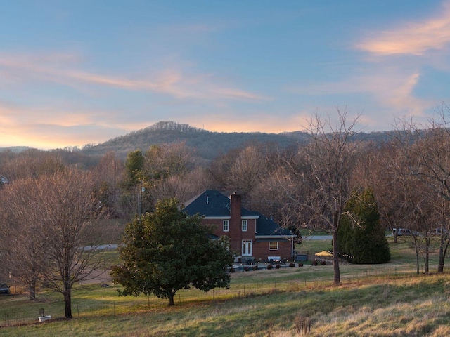 view of mountain feature with a rural view