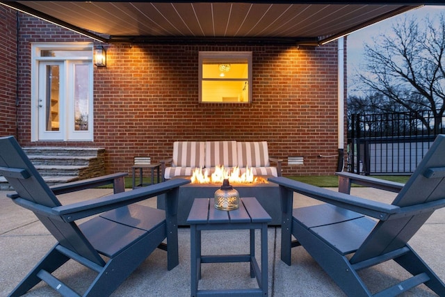 view of patio featuring an outdoor fire pit