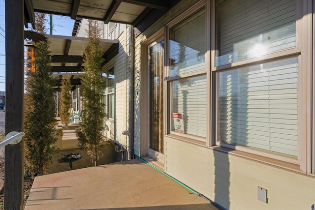 doorway to property featuring a patio area