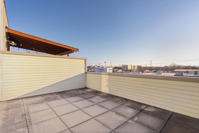 view of patio with a balcony