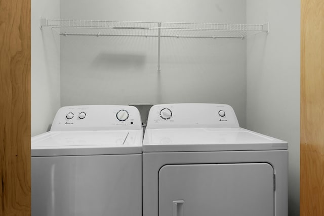 laundry room featuring washer and clothes dryer