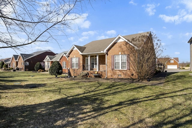 ranch-style home featuring a garage and a front yard