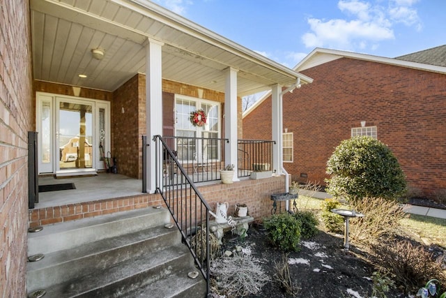 entrance to property with a porch