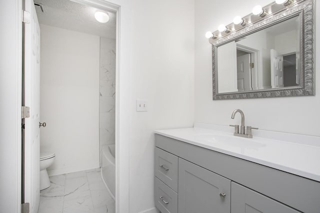 full bathroom featuring vanity, a textured ceiling, bathing tub / shower combination, and toilet