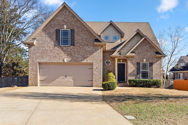 view of front facade with a garage and a front lawn