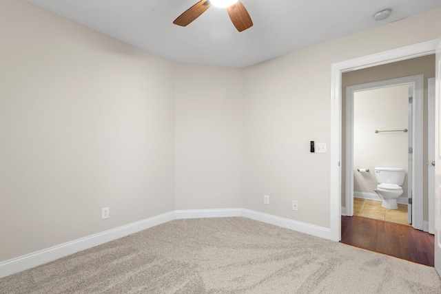 interior space with ceiling fan