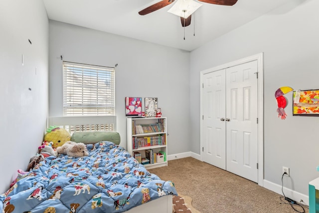 bedroom featuring carpet flooring, ceiling fan, and a closet