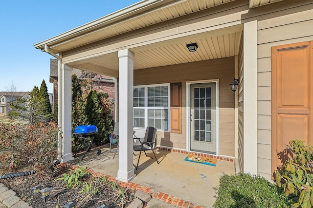 entrance to property with covered porch