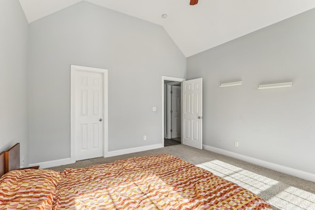 unfurnished bedroom with high vaulted ceiling, light carpet, and ceiling fan