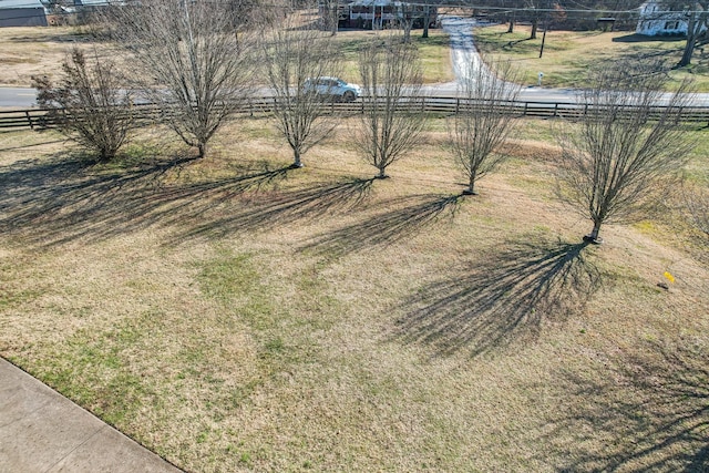 birds eye view of property featuring a rural view