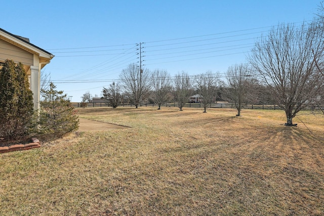 view of yard with a rural view