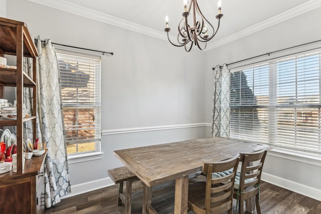 dining space with dark hardwood / wood-style flooring, a notable chandelier, and crown molding