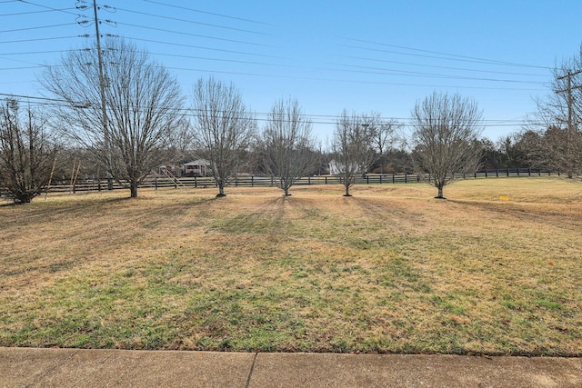 view of yard with a rural view