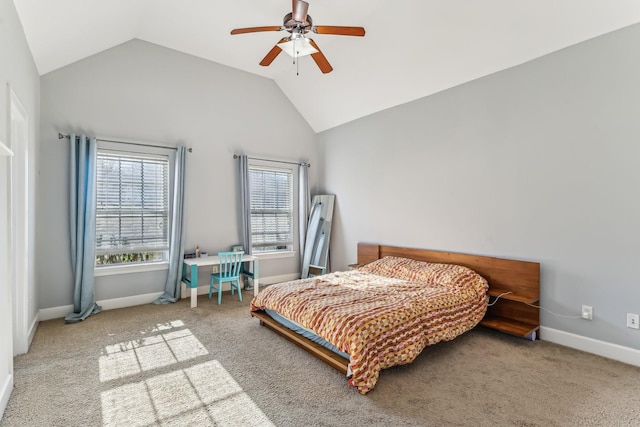 bedroom with ceiling fan, lofted ceiling, and carpet