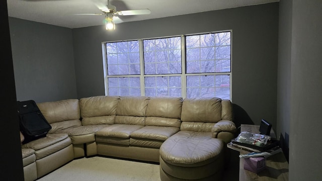 living room featuring ceiling fan